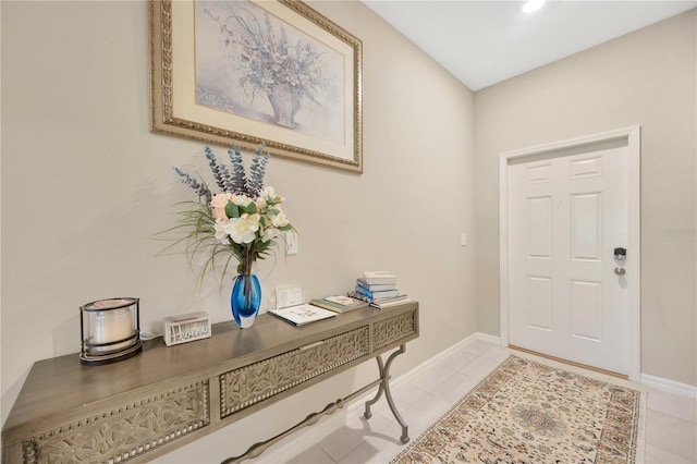 entrance foyer with light tile patterned flooring