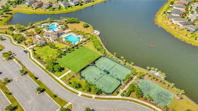 birds eye view of property featuring a water view