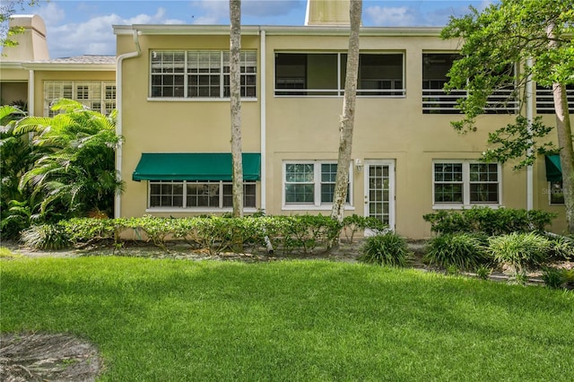 exterior space with a lawn