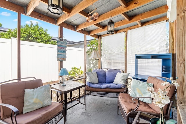 view of patio featuring an outdoor hangout area and fence