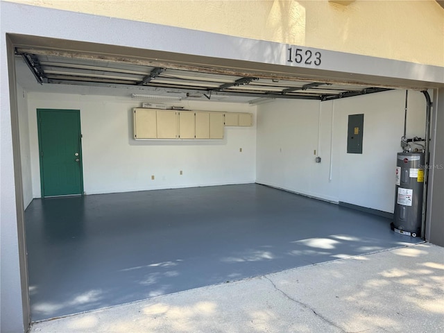 garage with electric panel and electric water heater