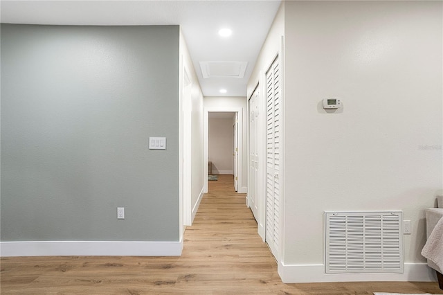 hallway featuring light hardwood / wood-style floors