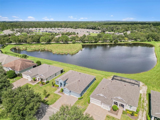 drone / aerial view with a water view