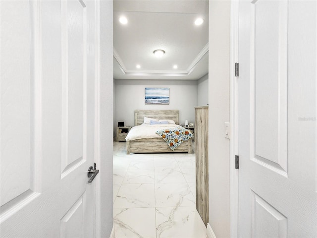 bedroom featuring crown molding and a tray ceiling