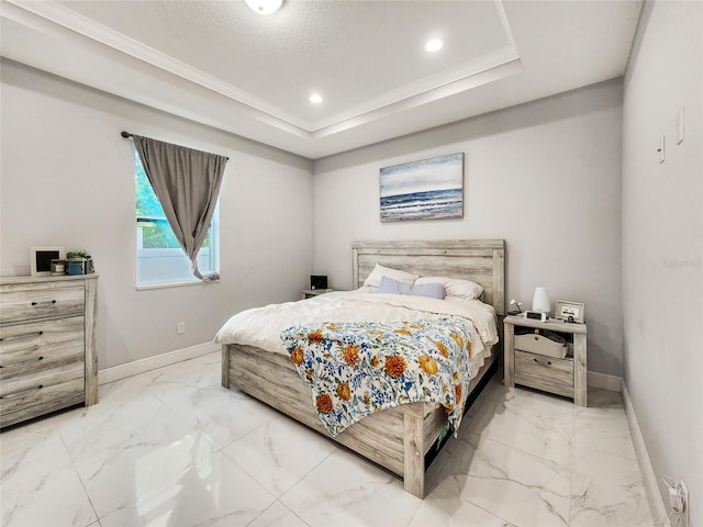 bedroom featuring crown molding, a raised ceiling, and a textured ceiling