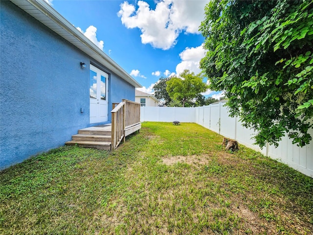 view of yard featuring a deck