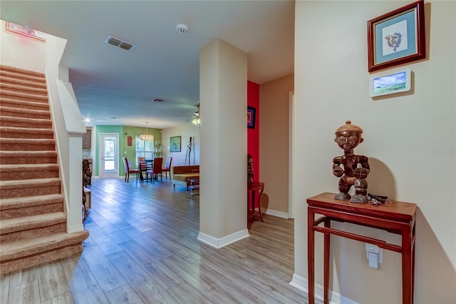 hall featuring light hardwood / wood-style flooring