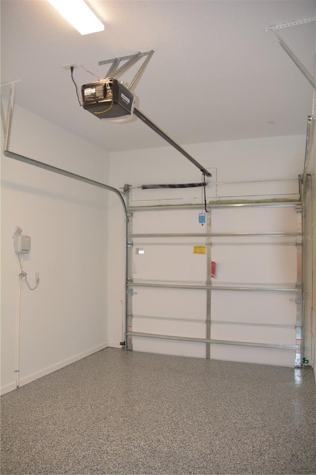 garage featuring a garage door opener