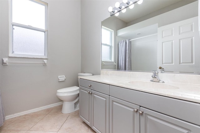 bathroom featuring tile patterned floors, vanity, toilet, and a shower with shower curtain