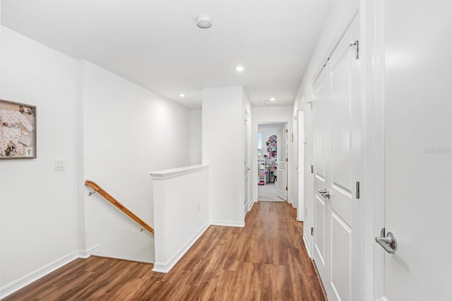 corridor with dark wood-type flooring