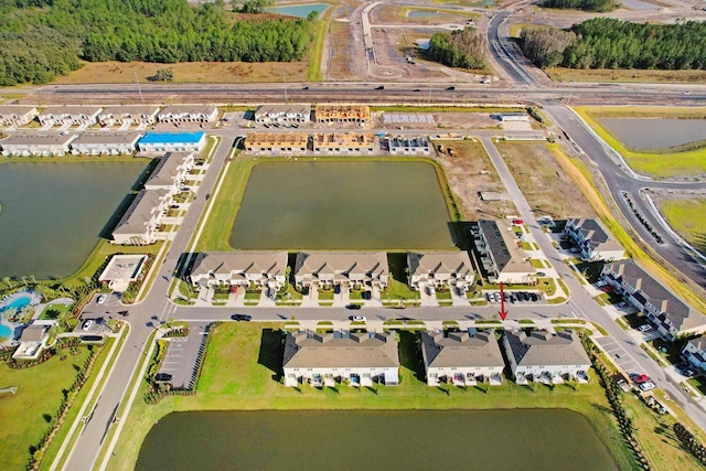 bird's eye view with a water view