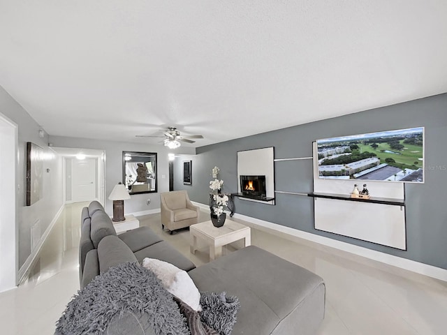 living room featuring ceiling fan