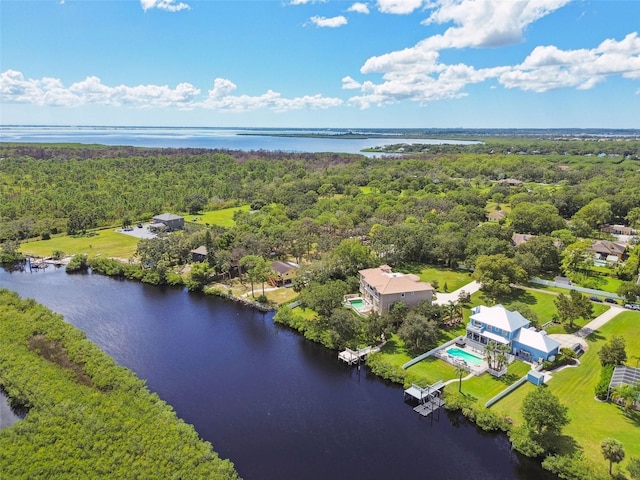 birds eye view of property featuring a water view