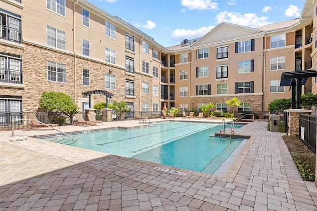 4221 W Spruce St Unit 1424, Tampa, FL 33607 - community pool featuring a patio
