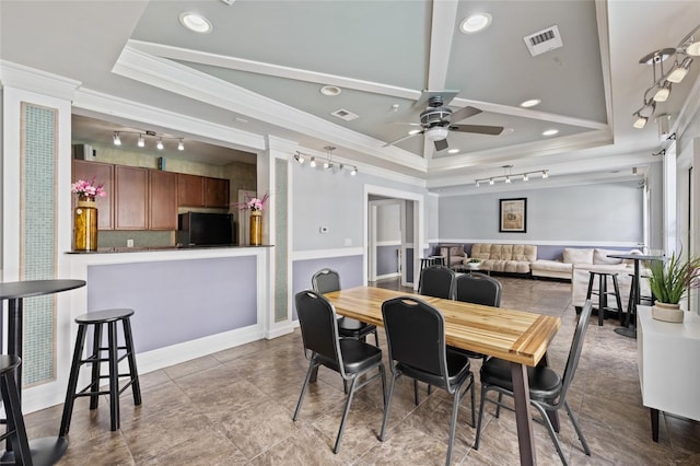 4221 W Spruce St Unit 1424, Tampa, FL 33607 - dining area with a tray ceiling, ornamental molding, ceiling fan, rail lighting, and recessed lighting