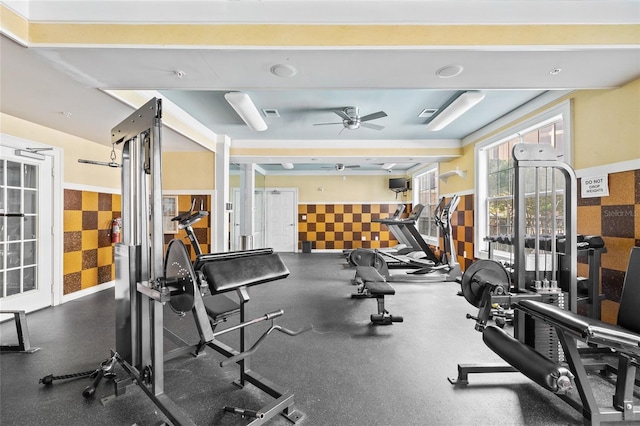 4221 W Spruce St Unit 1424, Tampa, FL 33607 - exercise room with ceiling fan and wallpapered walls