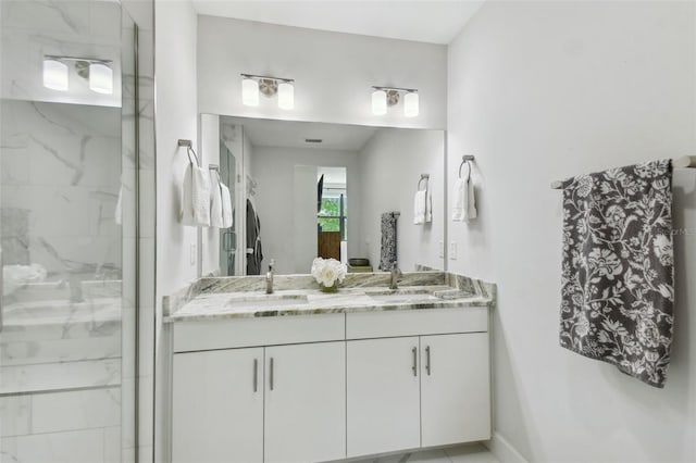 bathroom featuring vanity and walk in shower