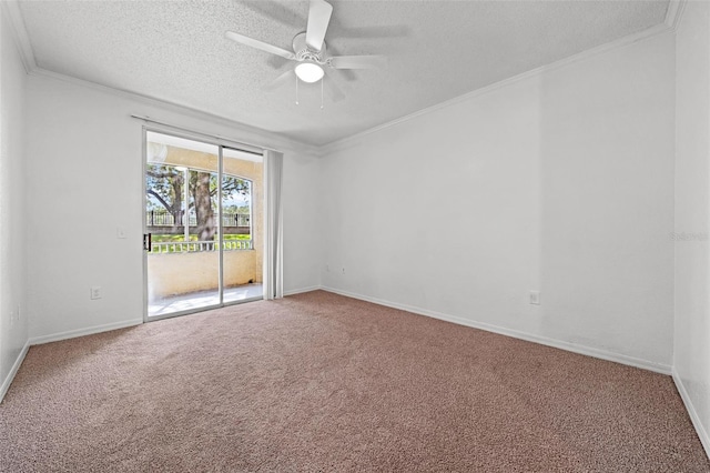 carpeted spare room featuring crown molding, ceiling fan, and a textured ceiling