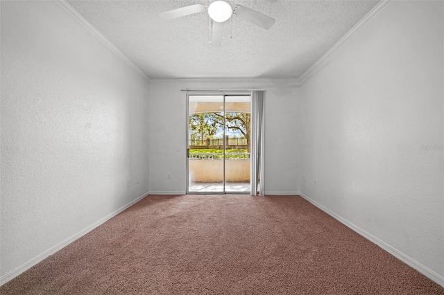 carpeted spare room with a textured ceiling, ceiling fan, and crown molding