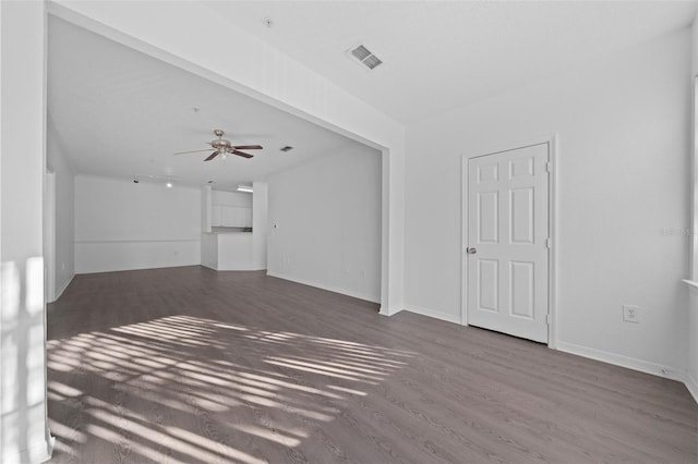 unfurnished living room with hardwood / wood-style floors and ceiling fan