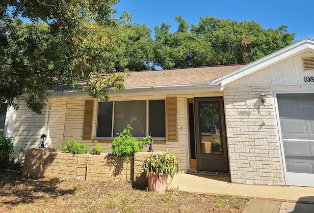 property entrance featuring a garage