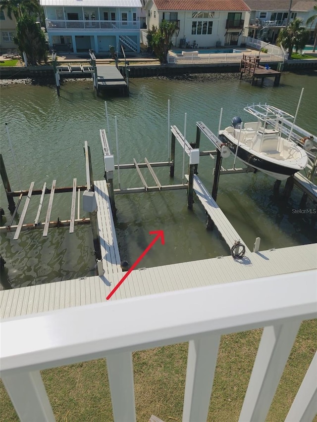 dock area featuring a water view and boat lift