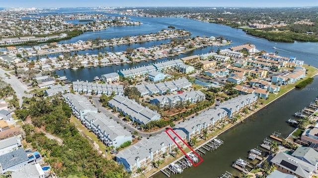 bird's eye view featuring a water view and a residential view