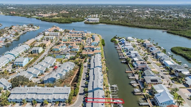 birds eye view of property featuring a residential view and a water view