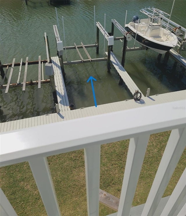 view of dock featuring a water view and boat lift