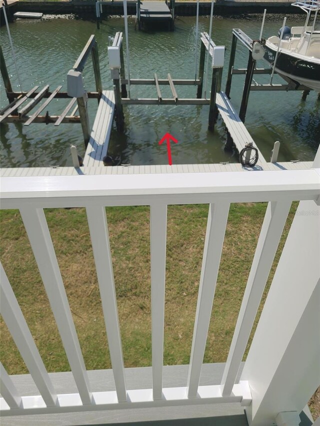 dock area featuring a water view and boat lift