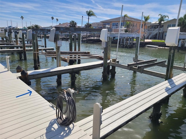 dock area featuring a water view and boat lift