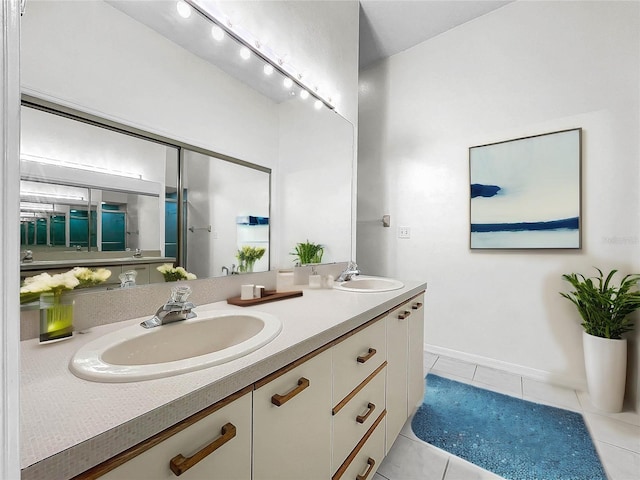 bathroom featuring tile patterned floors and vanity