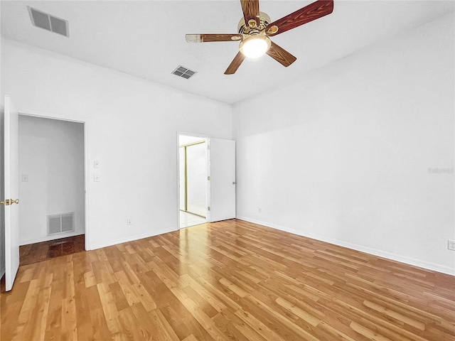 unfurnished room with ceiling fan and light hardwood / wood-style floors