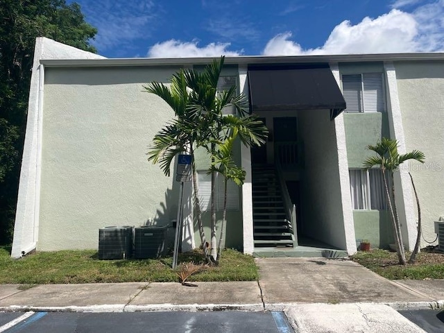 view of front of property featuring central AC unit