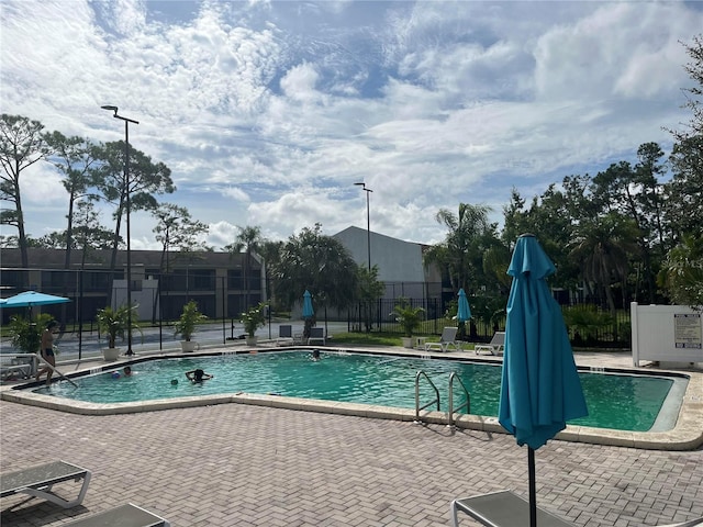 view of pool with a patio area