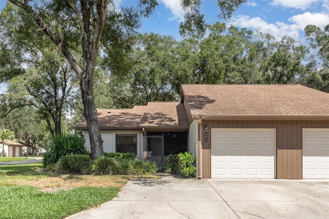 single story home featuring a garage