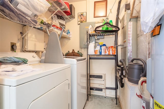 laundry room with light carpet and washing machine and clothes dryer