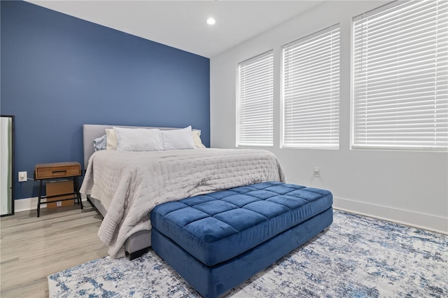 bedroom featuring light hardwood / wood-style floors