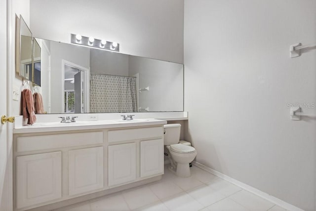 bathroom with vanity, tile patterned flooring, toilet, and a shower with shower curtain