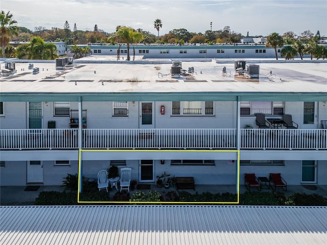 view of property featuring a community pool