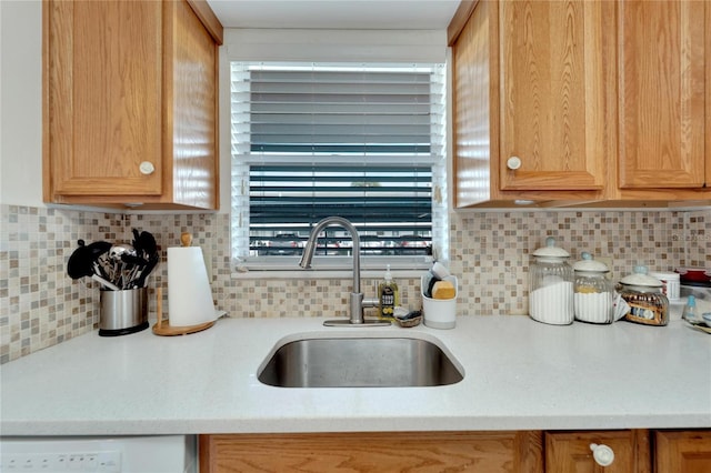 kitchen with backsplash and sink