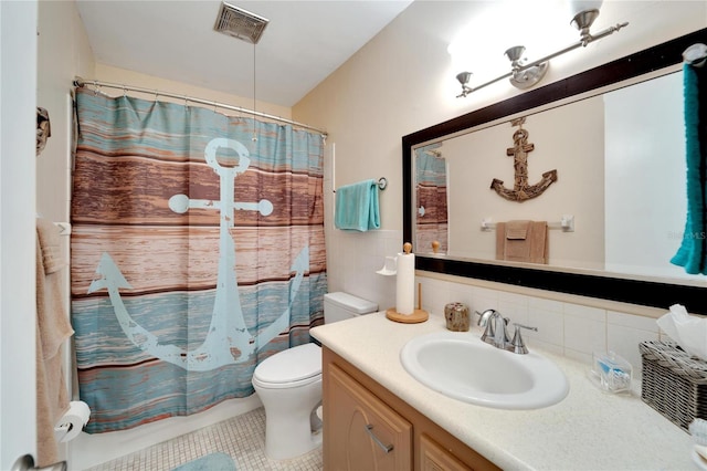 full bathroom featuring vanity, shower / tub combo, tile patterned floors, toilet, and decorative backsplash