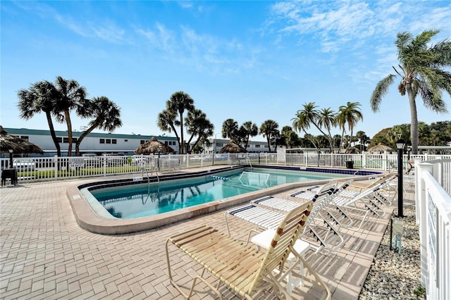 view of swimming pool featuring a patio area