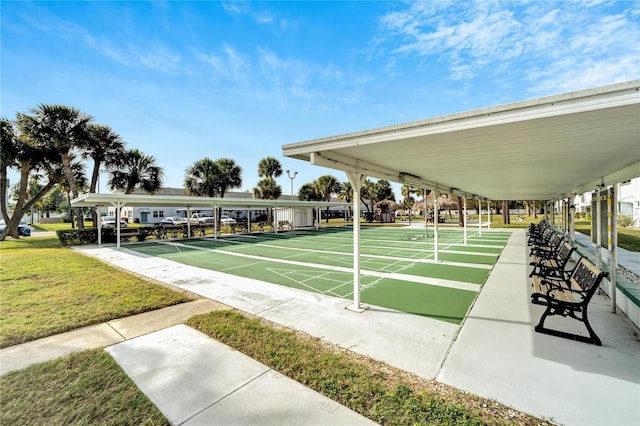 view of property's community featuring a yard