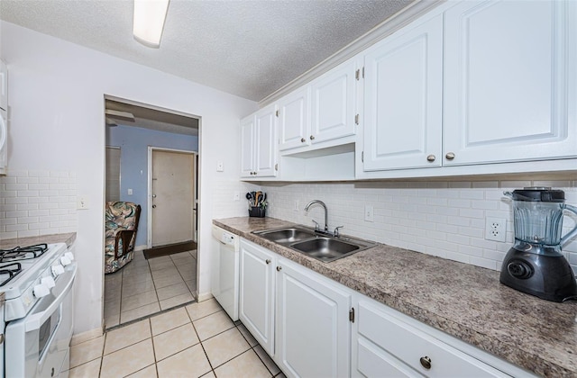 kitchen with white cabinetry, a textured ceiling, sink, and white appliances