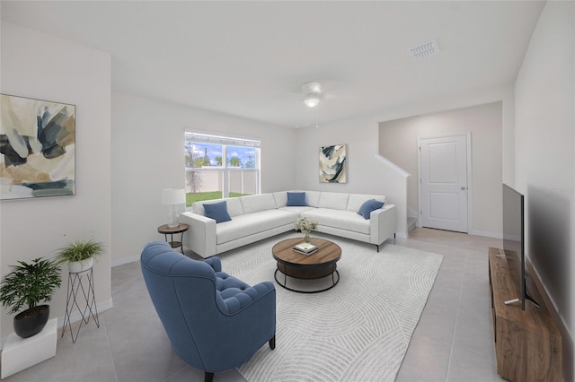 living room with light tile patterned flooring