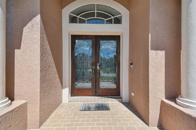 doorway to property featuring french doors