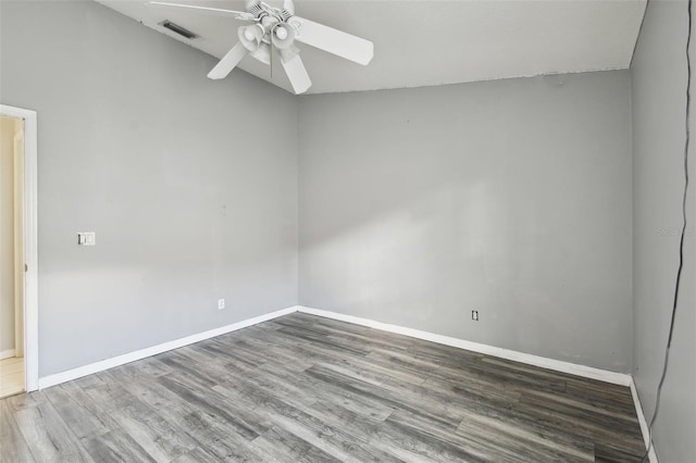 unfurnished room with ceiling fan and hardwood / wood-style flooring