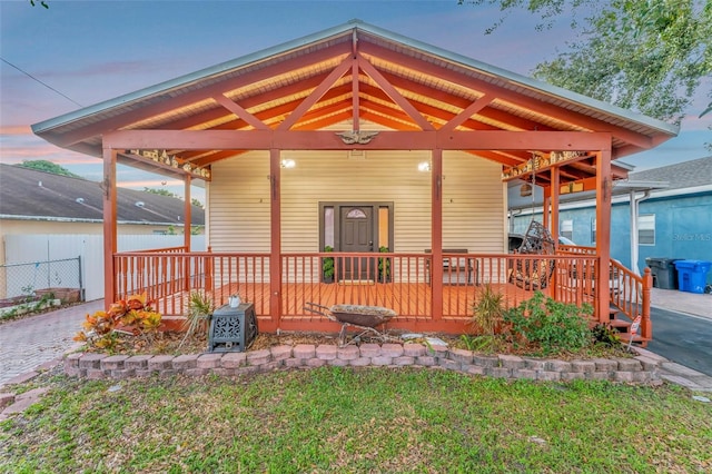 exterior space with a yard and covered porch