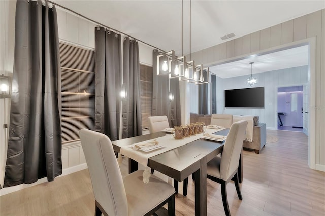 dining room with light wood-type flooring